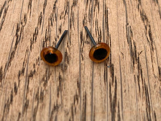 Ögon 6mm bruna 10 par.